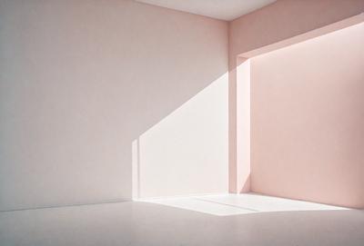 The primary subject of the image is a white wall with a pink doorway. The setting is a room with a white floor, and the visual style is a photo. The dominant colors are white and pink, creating a calm and serene atmosphere.