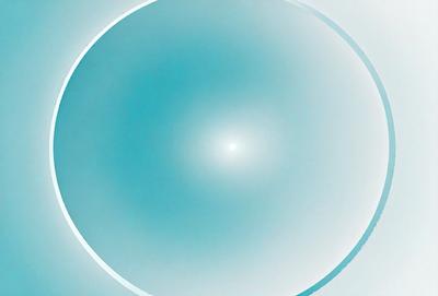 The primary subject of the image is a blue circle, which appears to be a circle of light. The setting is a blue background, which creates a contrasting and visually appealing effect. The visual style of the image is a combination of a photo and digital art, as it has a unique and artistic appearance. The dominant colors in the image are blue and white, creating a calm and serene atmosphere.