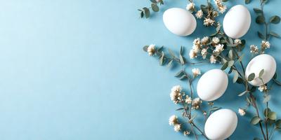 The primary subject of the image is a group of eggs, which are arranged in a visually appealing manner. The setting is a blue background, which adds a sense of calmness and tranquility to the scene. The visual style is a combination of photo and digital art, creating a realistic yet artistic representation of the eggs. The colors and mood of the image are predominantly white and blue, giving it a clean and serene atmosphere.