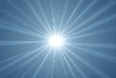 The primary subject of the image is a bright, sunny sky with a sun shining through the clouds. The setting is a clear blue sky, and the visual style is a photo. The colors and mood of the image are predominantly blue and bright, creating a serene and uplifting atmosphere.