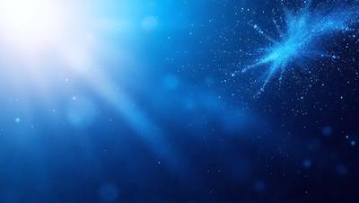 The primary subject of the image is a bright blue sky with a few stars scattered throughout. The setting is a night sky, and the visual style appears to be a photo. The colors and mood of the image are predominantly blue, creating a serene and peaceful atmosphere.