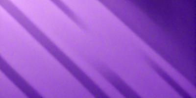The primary subject of the image is a purple wall with a pattern of vertical lines. The setting is a room with a purple background, and the visual style appears to be a photo. The dominant colors in the image are purple and white, creating a calm and serene atmosphere.