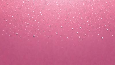 The primary subject of the image is a pink surface with a pattern of white droplets. The setting is a pink background, and the visual style appears to be a photo. The dominant colors are pink and white, creating a warm and inviting atmosphere.