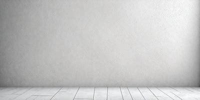 The primary subject of the image is a white wall. The setting is a room with a wooden floor. The visual style is a photo, and the colors and mood are predominantly white, giving the image a clean and minimalist appearance.