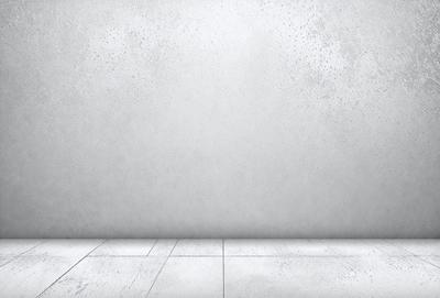 The primary subject of the image is a white wall with a grey background. The visual style is a photo, and the colors and mood are predominantly white and neutral.
