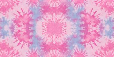 The primary subject of the image is a pink and blue tie-dye pattern. The setting is a pink and blue tie-dye fabric, which serves as the background. The visual style is a close-up of the tie-dye pattern, showcasing the intricate design. The colors and mood of the image are predominantly pink and blue, creating a vibrant and lively atmosphere.