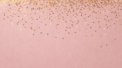 The primary subject of the image is a pink background with gold glittery confetti falling on it. The setting is a pink surface, and the visual style is a combination of a photo and digital art. The colors and mood of the image are predominantly pink and gold, creating a warm and festive atmosphere.