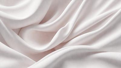 The primary subject of the image is a white sheet of fabric, which is the main object, scene, or focus of the image. The setting or background consists of a white background, which provides a clean and minimalistic appearance. The visual style of the image is a close-up of the fabric, showcasing its texture and details. The colors and mood of the image are predominantly white, giving it a clean, serene, and calming atmosphere.