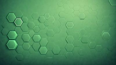 The primary subject of the image is a green wall with a pattern of hexagons. The setting is a room with a green background. The visual style is a close-up of the green wall, showcasing the hexagonal pattern. The colors and mood of the image are predominantly green, creating a calm and soothing atmosphere.