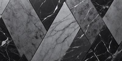 The primary subject of the image is a marble tile with a black and white pattern. The setting is a wall with a black and white marble tile pattern. The visual style is a close-up of the marble tile, showcasing its intricate design. The colors and mood of the image are predominantly black and white, giving it a classic and elegant appearance.