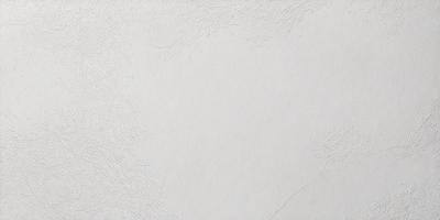 The primary subject of the image is a white sheet of paper with a pattern of holes. The setting is a white background, and the visual style appears to be a pattern or texture. The dominant colors are white and the overall atmosphere is clean and minimalistic.