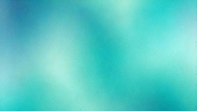 The primary subject of the image is a close-up of a blue and green ocean. The setting is underwater, with the ocean floor visible. The visual style is a photo of the ocean floor, showcasing the vibrant colors and natural beauty of the underwater environment. The dominant colors are blue and green, creating a serene and calming atmosphere.
