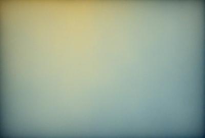 The image is a large, empty, and white canvas. The primary subject is the background, which is a plain, white wall. The setting is a room with a large, open space. The visual style is a simple, clean, and minimalist design. The colors and mood are predominantly white, creating a calm and serene atmosphere.