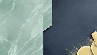 The primary subject of the image is a marble wall with a blue background. The setting is a room with a blue wall and a marble wall. The visual style is a combination of a photo and digital art, creating a unique and artistic representation of the marble wall. The colors and mood of the image are predominantly blue and gray, giving it a calm and sophisticated atmosphere.