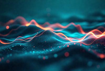 The primary subject of the image is a blue and orange wave pattern, which appears to be a digital art or illustration. The setting is a dark blue background, and the visual style gives the impression of a futuristic or technological theme. The dominant colors are blue and orange, creating a vibrant and dynamic atmosphere.