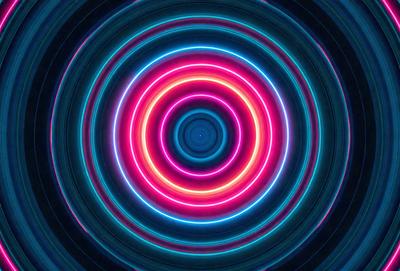 The primary subject of the image is a large, colorful, and circular object. The setting is a dark background, which contrasts with the bright colors of the circular object. The visual style appears to be a combination of a photo and digital art, creating a unique and eye-catching design. The dominant colors are pink, blue, and yellow, giving the image a vibrant and lively atmosphere.
