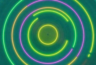 The primary subject of the image is a large, circular, neon green light. The light is surrounded by a purple circle, creating a visually striking and vibrant scene. The setting appears to be a dark background, which further emphasizes the brightness of the neon light. The visual style of the image is a combination of digital art and illustration, with the neon light and purple circle creating a unique and eye-catching pattern. The colors and mood of the image are predominantly green and pur