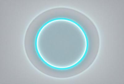 The primary subject of the image is a large, round, blue light source. The light appears to be a circle or a ring, and it is illuminating the surrounding area. The setting is a white wall, which provides a clean and minimalistic backdrop for the light. The visual style of the image is a combination of a photo and digital art, as the light source appears to be a digital creation. The colors and mood of the image are predominantly blue, creating a calm and serene atmosphere.