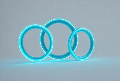 The primary subject of the image is three blue rings, which are arranged in a row. The setting is a white background, and the visual style appears to be a digital art or illustration. The dominant colors are blue, and the overall atmosphere is bright and vibrant.