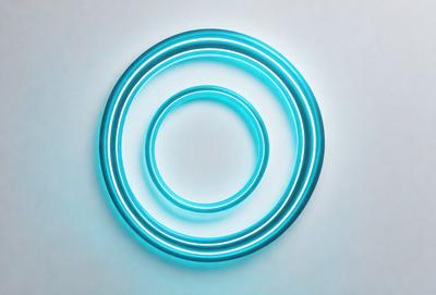 The primary subject of the image is a blue circle, which is the main object, scene, or focus of the image. The setting is a white background, and the visual style is a photo. The colors and mood of the image are predominantly blue, creating a calm and serene atmosphere.