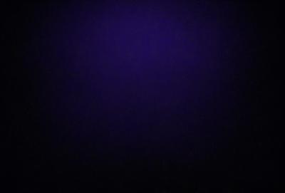 Purple background with no visible objects or textures.