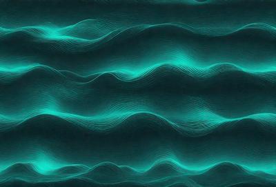 The primary subject of the image is a blue and green wave pattern, which is the main focus of the image. The setting is a blue and green background, creating a vibrant and lively atmosphere. The visual style is a digital art or illustration, as the wave pattern is intricately detailed and the colors are rich and vivid. The overall mood of the image is energetic and dynamic, as the wave pattern suggests movement and flow.