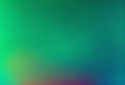 The primary subject of the image is a green background, which appears to be a colorful, textured surface. The setting or background is a brightly colored, abstract environment. The visual style of the image is a combination of photo and digital art, creating a unique and vibrant appearance. The colors and mood of the image are predominantly green, with a lively and energetic atmosphere.