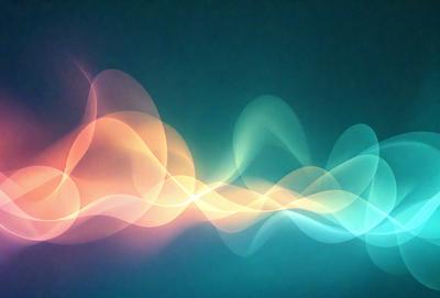 The primary subject of the image is a series of colorful, swirling lines or waves, which are displayed against a blue background. The visual style of the image appears to be a digital art or illustration, as the lines are smooth and well-defined. The dominant colors in the image are blue and orange, creating a vibrant and energetic atmosphere.