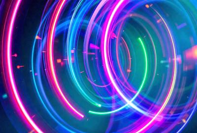 The primary subject of the image is a colorful, swirling, and vibrant light display. The setting is a dark background, which contrasts with the bright and lively colors of the light display. The visual style of the image is a combination of digital art and illustration, creating a dynamic and captivating scene. The dominant colors in the image are blue, green, and purple, which contribute to a lively and energetic atmosphere.