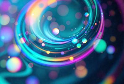 The primary subject of the image is a swirling, colorful, and vibrant pattern. The setting is a blue background, which adds to the overall atmosphere. The visual style is a combination of digital art and illustration, creating a dynamic and lively scene. The colors and mood are predominantly blue and purple, with a hint of green, giving the image a calming and serene appearance.
