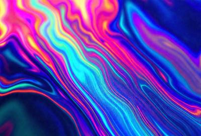 The primary subject of the image is a colorful, swirling pattern that resembles a painting or a digital artwork. The setting is a blue and green background, which adds to the vibrant and lively atmosphere of the scene. The visual style is a mix of photo and digital art, creating a unique and eye-catching effect. The dominant colors are blue, green, and orange, which contribute to the overall mood of the image, evoking a sense of energy and creativity.