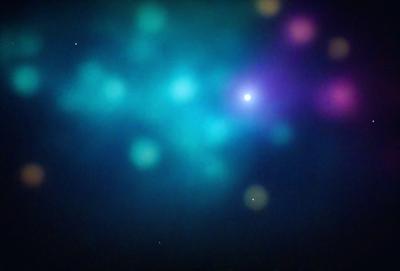 The primary subject of the image is a brightly colored, swirling pattern of lights in a dark space. The setting appears to be a night sky, with the lights creating a mesmerizing visual effect. The visual style of the image is a combination of digital art and illustration, as the swirling pattern of lights is created through a blend of colors and shapes. The overall atmosphere of the image is one of wonder and awe, as the viewer is drawn into the captivating display of light and color.