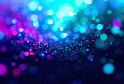 The primary subject of the image is a colorful, swirling pattern of lights, which creates a vibrant and lively atmosphere. The setting is a dark background, which contrasts with the bright and colorful lights. The visual style of the image is a combination of digital art and illustration, as it features a unique and artistic representation of light. The colors and mood of the image are predominantly blue and pink, giving it a warm and inviting feel.