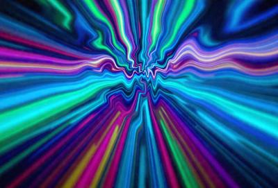 The primary subject of the image is a colorful, swirling pattern that resembles a kaleidoscope. The setting is a blue background, and the visual style appears to be a digital art or illustration. The dominant colors in the image are blue, green, and pink, creating a vibrant and lively atmosphere.