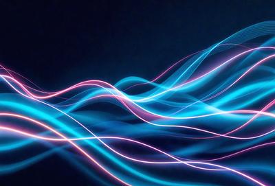 The primary subject of the image is a blue and pink light wave, which appears to be a digital art or illustration. The setting is a dark background, which contrasts with the vibrant colors of the light wave. The visual style gives the impression of a futuristic or technological theme. The dominant colors are blue and pink, creating a lively and energetic atmosphere.