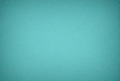 The primary subject of the image is a large, empty, and dark blue surface. The setting is a vast, open space with no visible objects or background. The visual style is a simple, clean, and minimalistic design. The colors and mood are predominantly dark and moody, with the blue surface creating a sense of depth and vastness.