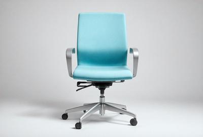 The primary subject of the image is a blue chair with a silver base. The chair is positioned on a white surface, which serves as the background. The visual style of the image is a photo, capturing the chair and its base in detail. The colors and mood of the image are predominantly blue and white, creating a clean and modern atmosphere.
