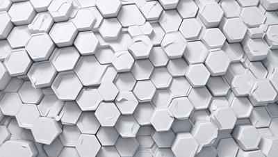 The primary subject of the image is a white, geometric pattern. The pattern is composed of hexagons, which are arranged in a honeycomb-like structure. The setting is a white wall, which serves as the background for the pattern. The visual style of the image is a combination of photo and digital art, as it appears to be a close-up of the pattern, with a slightly blurred background. The colors and mood of the image are predominantly white, giving it a clean and minimalist appearance.