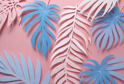 The primary subject of the image is a collection of blue and white palm tree cutouts. These cutouts are arranged in various positions, creating a visually appealing and artistic display. The setting is a pink wall, which serves as a striking backdrop for the palm tree cutouts. The visual style of the image is a combination of digital art and illustration, as the cutouts are carefully crafted and placed to create a cohesive and eye-catching design. The colors and mood of the image are