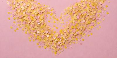 The primary subject of the image is a heart-shaped arrangement of yellow and pink hearts. The hearts are scattered across a pink background, creating a visually appealing and colorful display. The visual style of the image is a combination of digital art and illustration, as the hearts are arranged in a pattern and the overall atmosphere is warm and inviting.