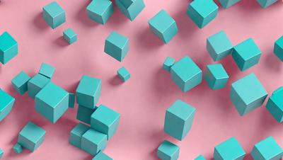 The primary subject of the image is a collection of blue cubes, which are scattered across a pink background. The setting appears to be a creative and artistic environment, possibly a digital art or illustration. The visual style of the image is a mix of photo and digital art, creating a unique and eye-catching composition. The dominant colors in the image are blue and pink, which contribute to a lively and vibrant atmosphere.