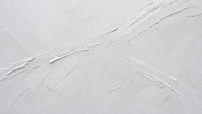 The primary subject of the image is a white surface with a pattern of white lines. The setting appears to be a white wall, and the visual style is a close-up of the white surface. The dominant colors in the image are white, and the overall atmosphere is clean and minimalistic.