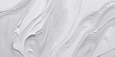 The primary subject of the image is a white wall with a pattern of swirls and waves. The setting is a room with a white background, and the visual style appears to be a combination of a photo and digital art. The dominant colors are white and gray, creating a clean and minimalist atmosphere.