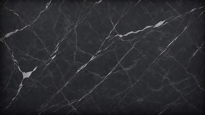 The primary subject of the image is a marble countertop. The setting is a black marble countertop, which serves as the background. The visual style is a close-up of the marble countertop, showcasing its texture and pattern. The colors and mood of the image are predominantly black, giving it a sleek and sophisticated appearance.