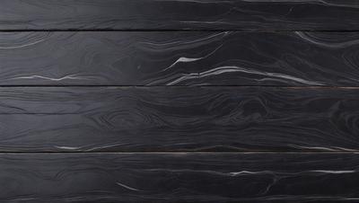 The primary subject of the image is a wooden surface with a black background. The setting appears to be a room with a black countertop. The visual style is a close-up of the wooden surface, which gives the image a textured and natural appearance. The dominant colors are black and brown, creating a moody and sophisticated atmosphere.