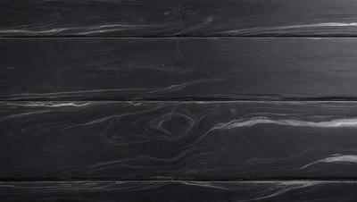The primary subject of the image is a black wooden surface, possibly a table or a wall. The setting is a room with a black and white color scheme. The visual style is a close-up of the wooden surface, showcasing its texture and details. The colors and mood of the image are predominantly black and white, giving it a classic and timeless appearance.