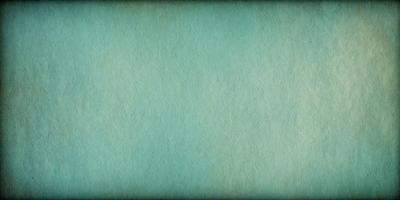 The primary subject of the image is a blue wall with a textured surface. The setting is a room with a blue wall, and the visual style is a photo. The dominant colors are blue and green, creating a calm and soothing atmosphere.