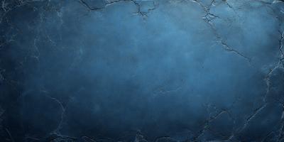 The primary subject of the image is a blue wall with a textured surface. The setting is a room with a blue wall, and the visual style is a photo. The dominant colors are blue and grey, creating a calm and soothing atmosphere.