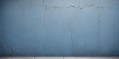 The primary subject of the image is a blue wall with a cracked and chipped appearance. The setting is a room with a blue wall, and the visual style is a photo. The dominant colors are blue and grey, creating a moody atmosphere.