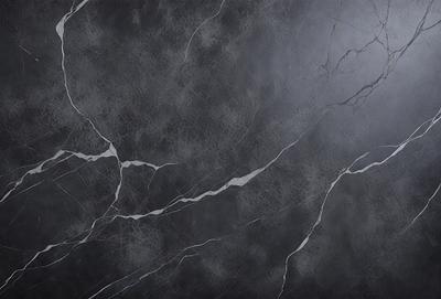 The primary subject of the image is a close-up of a marble wall with a textured surface. The setting is a room with a black background, which emphasizes the marble wall. The visual style is a photo, capturing the intricate details of the marble wall. The colors and mood of the image are predominantly black and white, giving it a classic and elegant appearance.